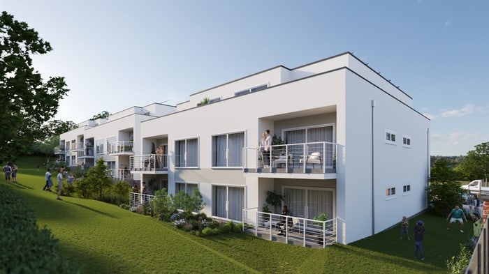 Modernes, weißes Wohngebäude mit mehreren Balkonen und grüner Wiese im Vordergrund.